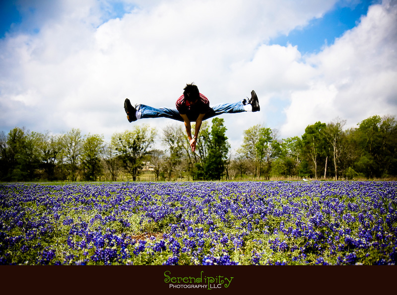 split kick in a field of bluebonnets