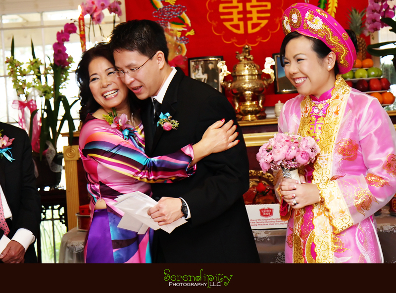  tea ceremony, Buddhist temple, kim son, Vietnamese wedding, mother hugs son-in-law