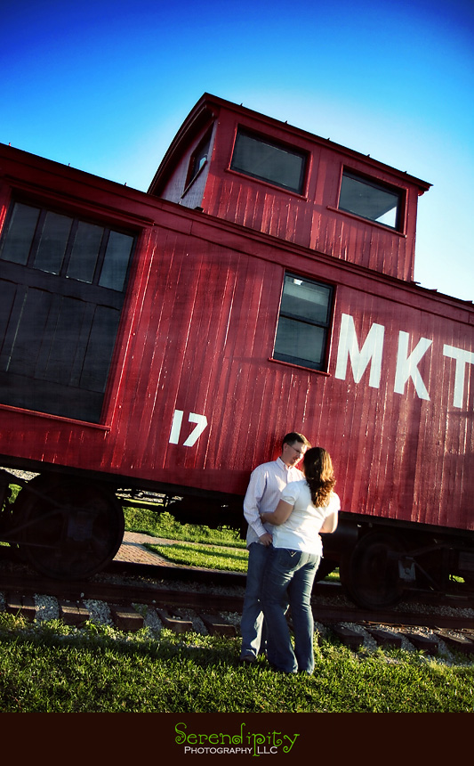  engagement session, Katy, Texas, in front of caboose