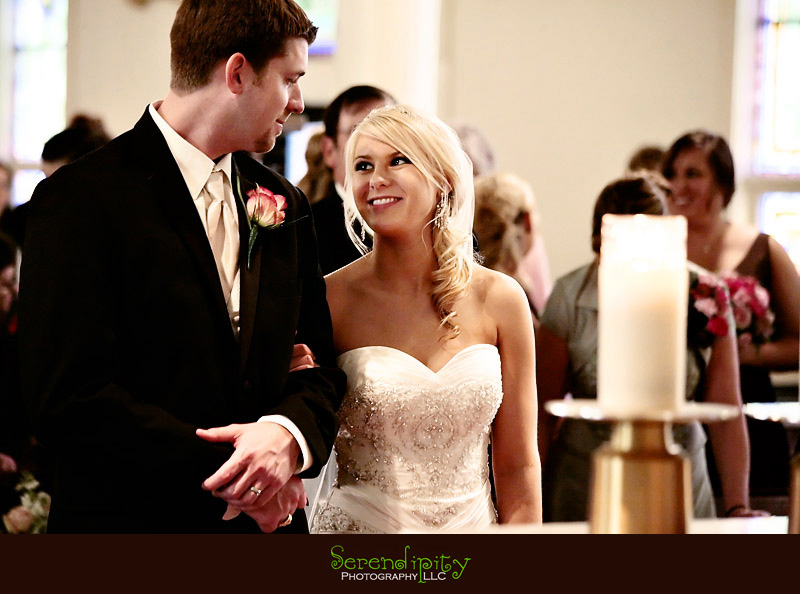 shiner texas, houston wedding photographer, bride and groom looking at each other during ceremony