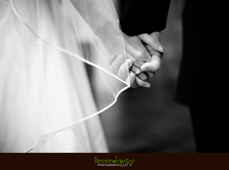 houston wedding photographer, Magnolia Hotel, bride and groom holding hands during ceremony