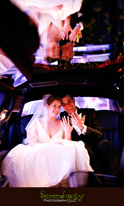houston wedding photographer, Magnolia Hotel, bride and groom in the limo
