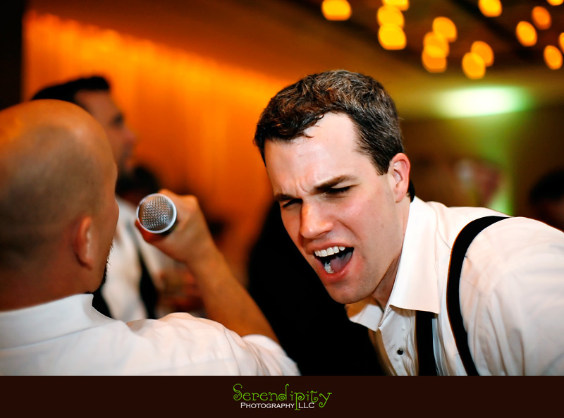 houston wedding photographer, Magnolia Hotel, groom karaoke