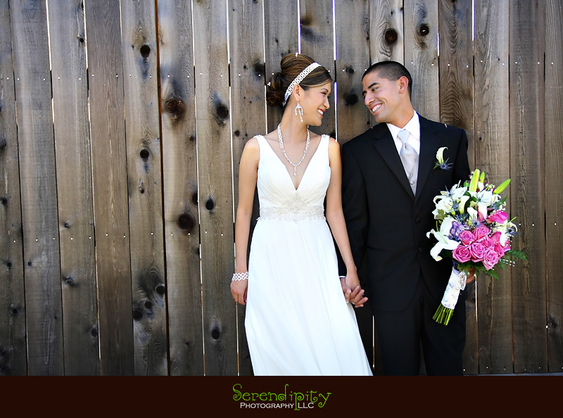 houston wedding photographer, St Edith Stein, Hotel Derek, Kim Son, bride and groom portrait by the church
