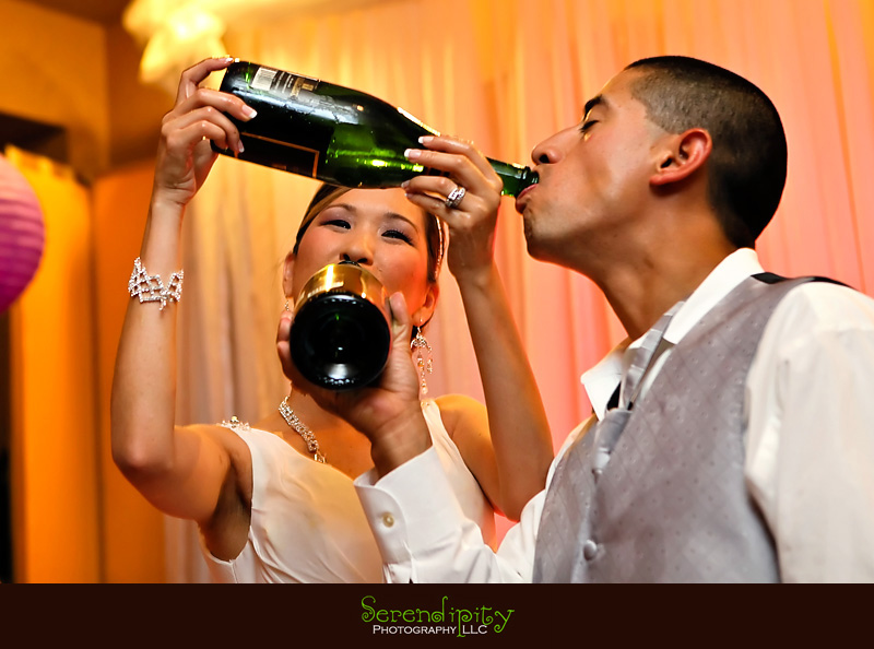 houston wedding photographer, St Edith Stein, Hotel Derek, Kim Son, bride and groom drinking from the bottle