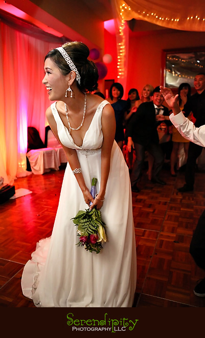 houston wedding photographer, St Edith Stein, Hotel Derek, Kim Son, bouquet toss