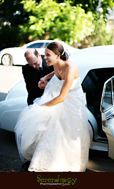 Houston wedding photographer, Hotel Derek, All Saints Catholic Church, father of the bride helping bride get off limo