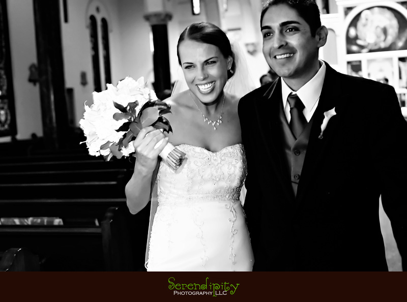 Houston wedding photographer, Hotel Derek, All Saints Catholic Church, bride and groom recessional