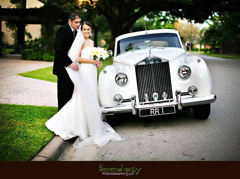 Houston wedding photographer, Hotel Derek, All Saints Catholic Church, bride and groom portrait with Rolls-Royce