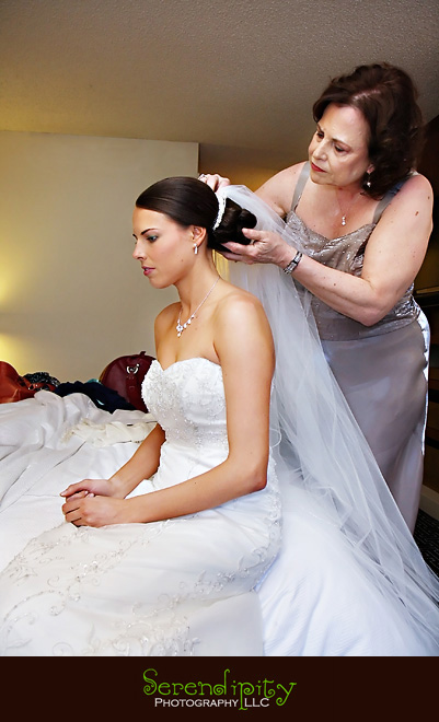 Houston wedding photographer, Hotel Derek, All Saints, mom helping bride with veil