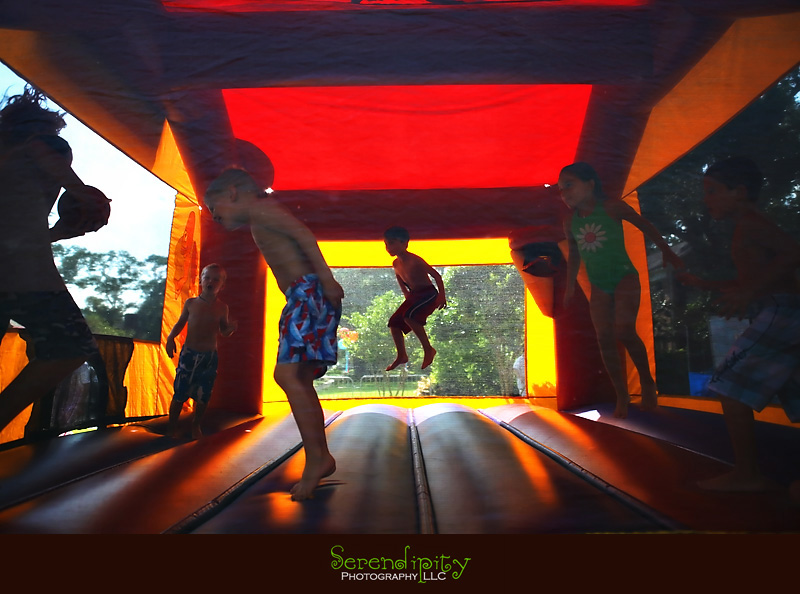 River Oaks Photography, Children Birthday Party Photography, kids  jumping inside moonwalk