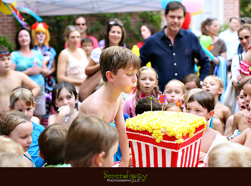 River Oaks Photography, Children Birthday Party Photography, birthday boy blowing out candle