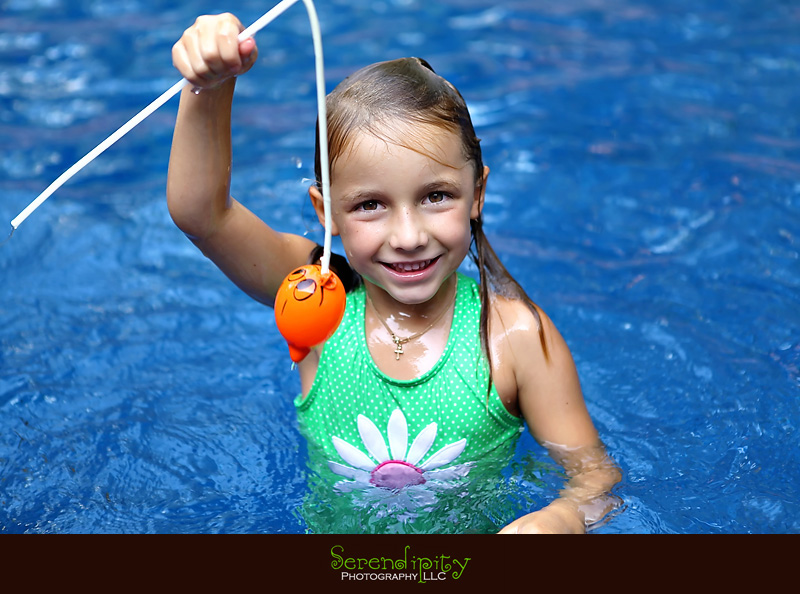 River Oaks Photography, Children Birthday Party Photography, girl in the pool with balloon fish
