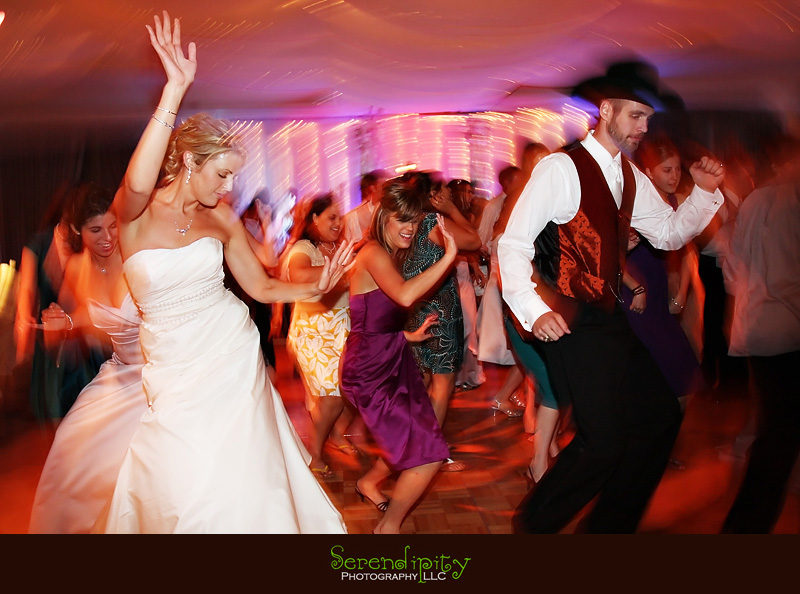 Houston wedding photographer, St Michael Catholic Church, Houstonian Resort and Spa, bride and groom partying