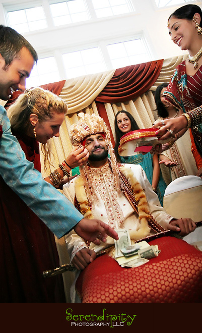 Houston wedding photographer, Destination Wedding Photography, groom getting ready before riding the horse for the indian wedding parade