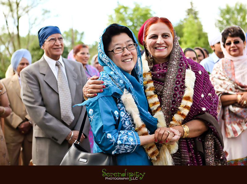 Houston wedding photographer, Destination Wedding Photography, the moms hugging each other
