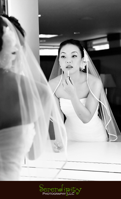 Houston wedding photographer, Memorial Drive Presbyterian, bride putting on lip gloss