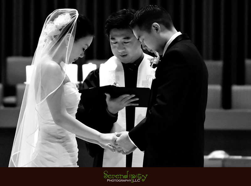 Houston wedding photographer, Memorial Drive Presbyterian, bride and groom praying on the alter