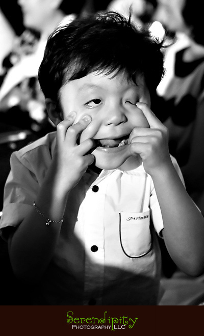 Houston wedding photographer, Memorial Drive Presbyterian, kid makes goofy face