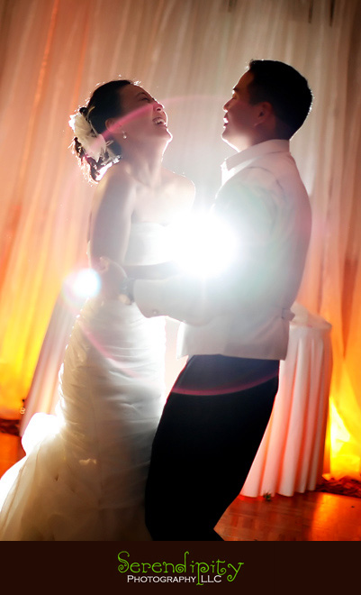 Houston wedding photographer, Memorial Drive Presbyterian, bride and groom dancing, having a good time