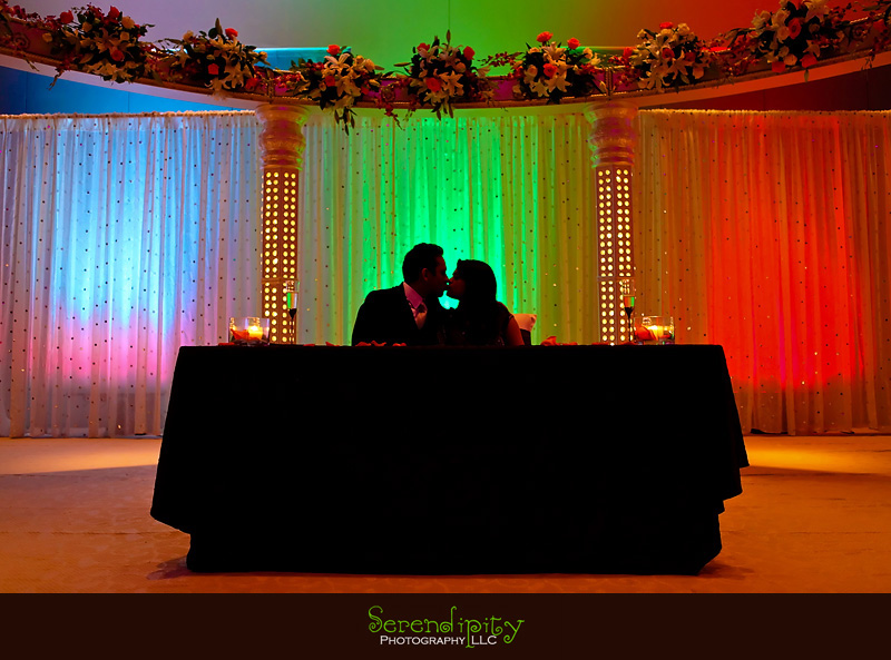 Houston wedding photographer, Hindu Temple, Hindu Wedding, Indian Wedding, bride and groom kissing on stage