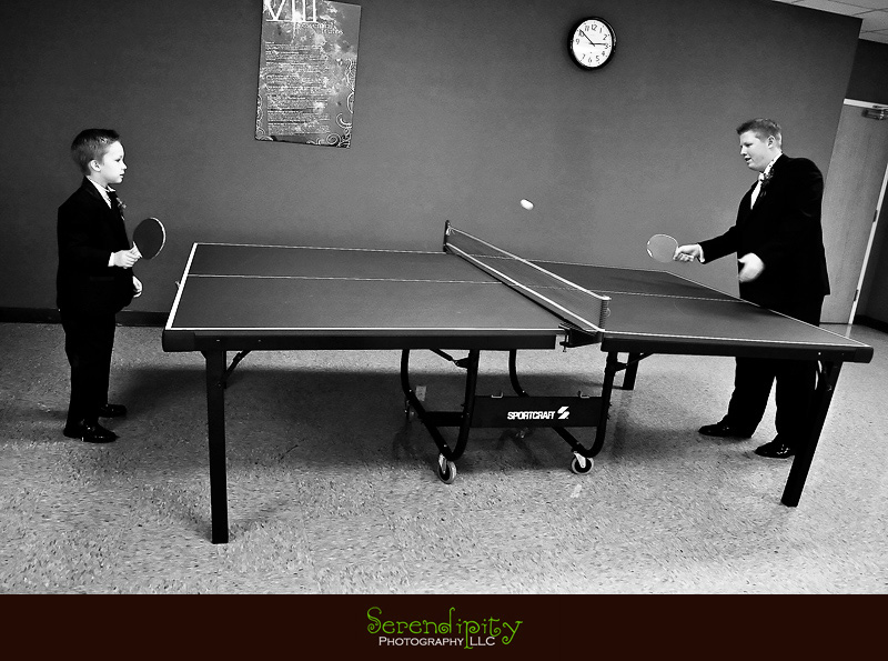 Houston wedding photographer, Pearland Church Ceremony, Private Home Reception, groom playing pingpong before ceremony