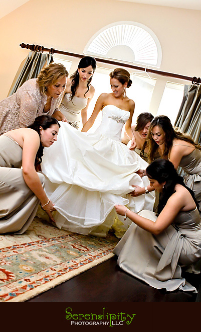 Houston wedding photographer, St George Orthodox Christian Church Ceremony, Alden Hotel Reception, girls helping the bride with dress