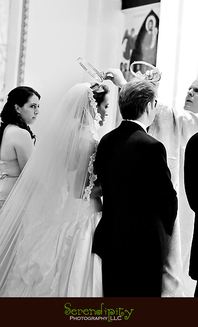 Houston wedding photographer, St George Orthodox Christian Church Ceremony, Alden Hotel Reception, bride and groom getting crowned