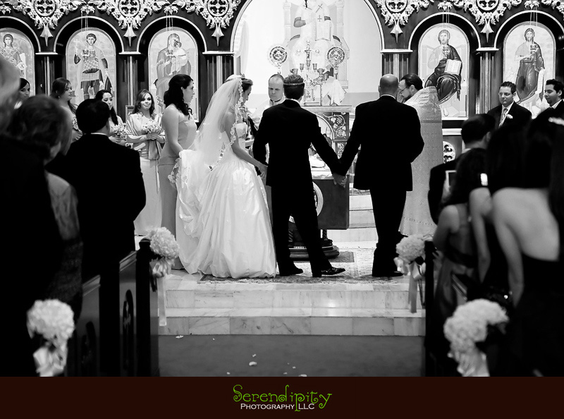 Houston wedding photographer, St George Orthodox Christian Church Ceremony, Alden Hotel Reception, bride and groom walking around the bible