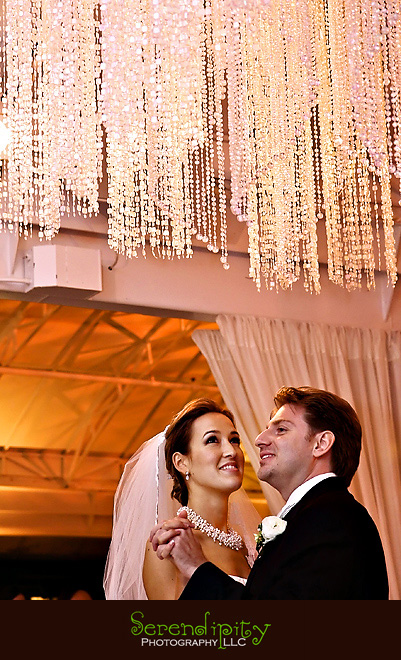Houston wedding photographer, St George Orthodox Christian Church Ceremony, Alden Hotel Reception, bride looking at the decoration, champagne color theme