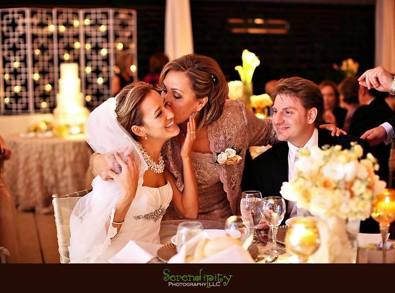 Houston wedding photographer, St George Orthodox Christian Church Ceremony, Alden Hotel Reception, sweet moment, mom giving bride a kiss, champagne color theme