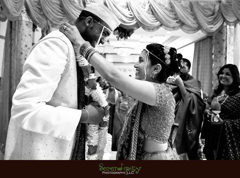 Houston Indian wedding photography, Marriott Hotel, groom sees bride for the first time, exchange flower necklace