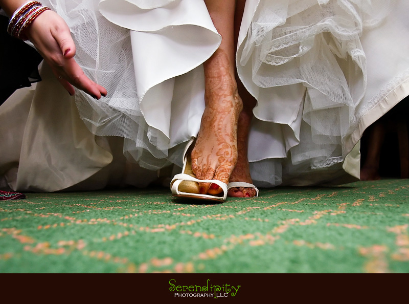 Houston Indian wedding photography, Marriott Hotel, bride putting on her shoes, bridal shoes, getting ready