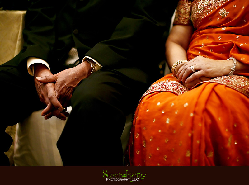 Houston Indian wedding photography, Marriott Hotel, parents' hands, wedding ceremony