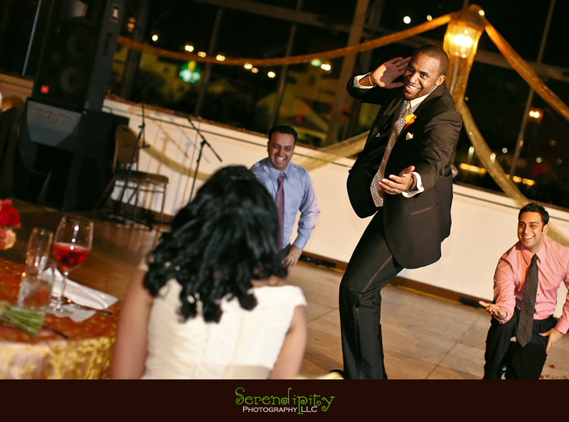 Houston Indian wedding photography, Marriott Hotel, wedding reception, groom performs a dance