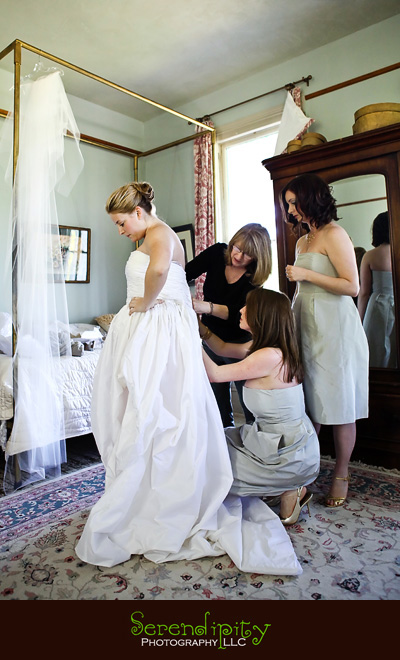 Austin wedding photography, outdoor ceremony, Barr Mansion, bridesmaids helping bride get dressed
